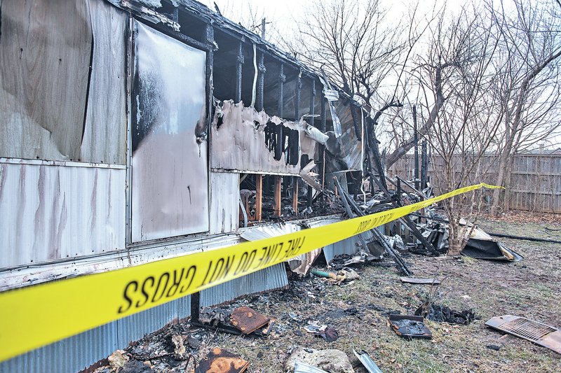  STAFF PHOTO ANTHONY REYES A man died Monday from injuries suffered Sunday in a trailer fire at 1487 Midway Ave. in Springdale.