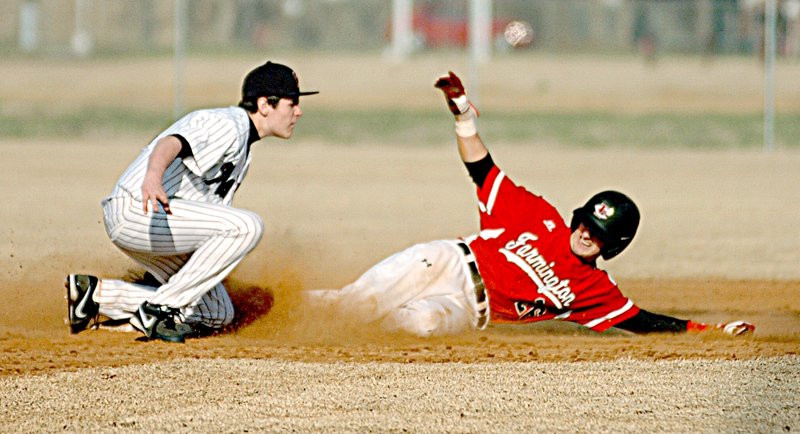 Photo by Randy Moll A Farmington base runner was tagged out by Wyatt Clark while attempting to steal second base during play on April 1.