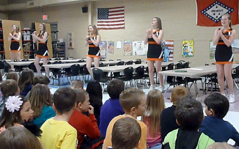 Submitted Photo Gravette Junior High Cheerleaders attended a recent Rise & Shine assembly at Glenn Duffy Elementary School where they helped demonstrate the results of the character word "effort" through their performance. From the left are Haley Willoughby, Melissa Ross, Micayla Hendricks, Haylee Blount and Zoe Betz. The young ladies are coached by Faith Hendricks.
