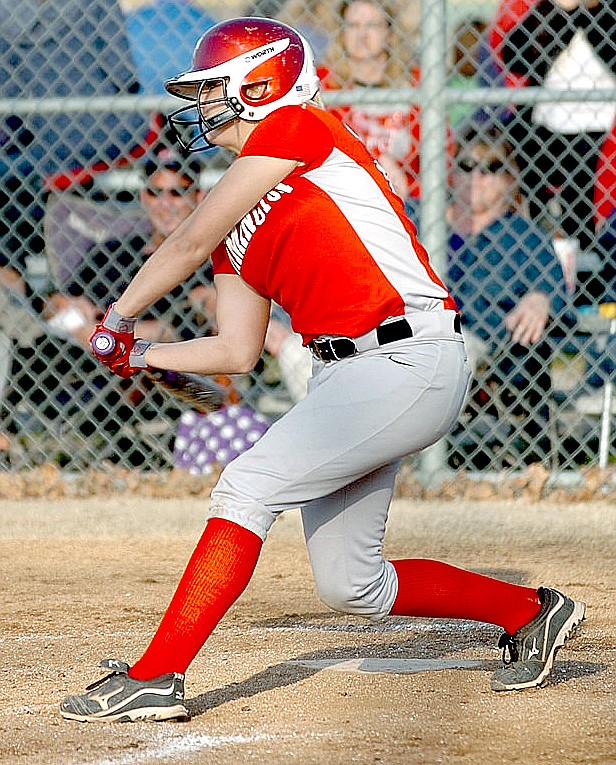 RANDY MOLL NWA MEDIA Farmington junior Bethany Doty takes a swing during a game at Gentry. Doty blasted a grand-slam to break open a scoreless game in the fourth inning on April 1. Farmington defeated Gentry 11-0.