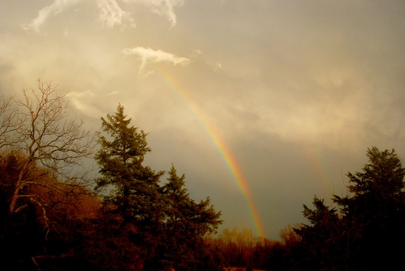 Photo by Terry Stanfill A double rainbow appeared in the storm clouds on Thursday near Gentry.