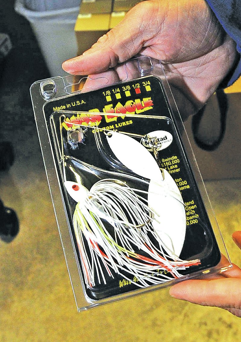 STAFF PHOTO FLIP PUTTHOFF Sales of spinner baits made at War Eagle Custom Lures in Rogers are already good in April. The Walmart FLW Tour bass tournament adds to the bottom line, said Keith Brashers, owner.