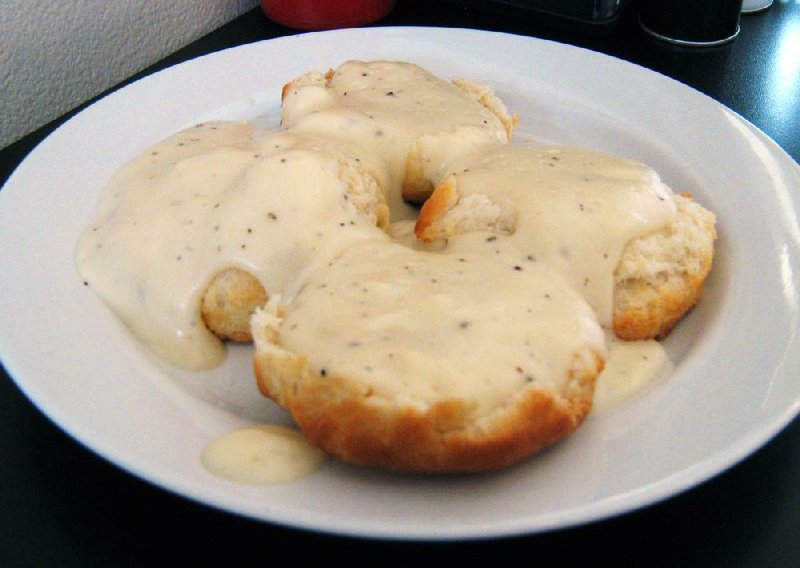 Two biscuits topped with creamy gravy come with the Country Breakfast at Two Sisters Catering in Sherwood. 