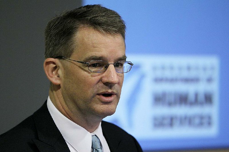 Arkansas Medicaid Director Andy Allison speaks Tuesday, July 2, 2013 at a public hearing in Little Rock on the state's plan to use federal Medicaid money to purchase private insurance for thousands of low-income residents. (AP Photo/Danny Johnston)