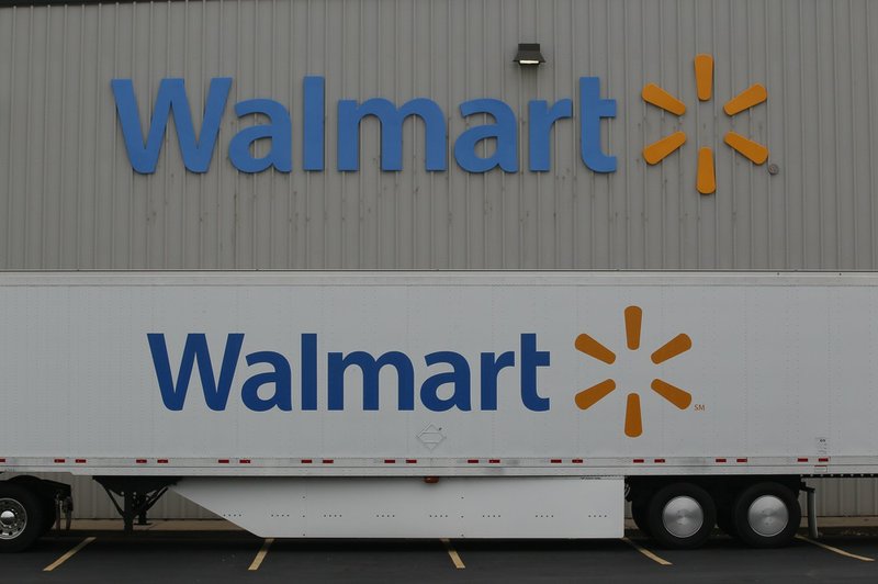 The Wal-Mart company logo is seen outside a Wal-Mart Stores Inc. distribution center in Bentonville on June 6, 2013. 