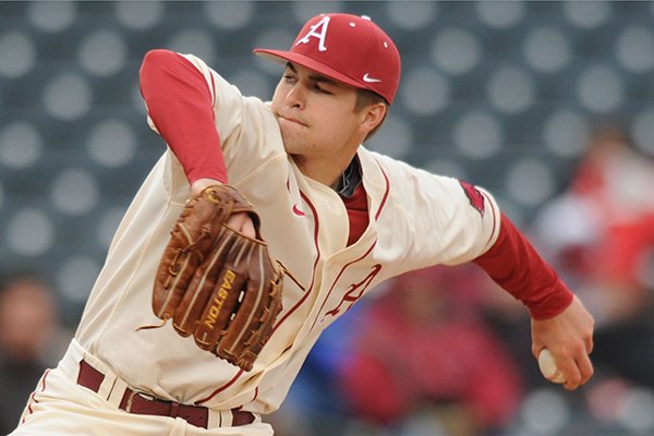 Arkansas starter Jalen Beeks delivers a pitch during the third inning against South Alabama Friday, Feb. 28, 2014, at Baum Stadium in Fayetteville.