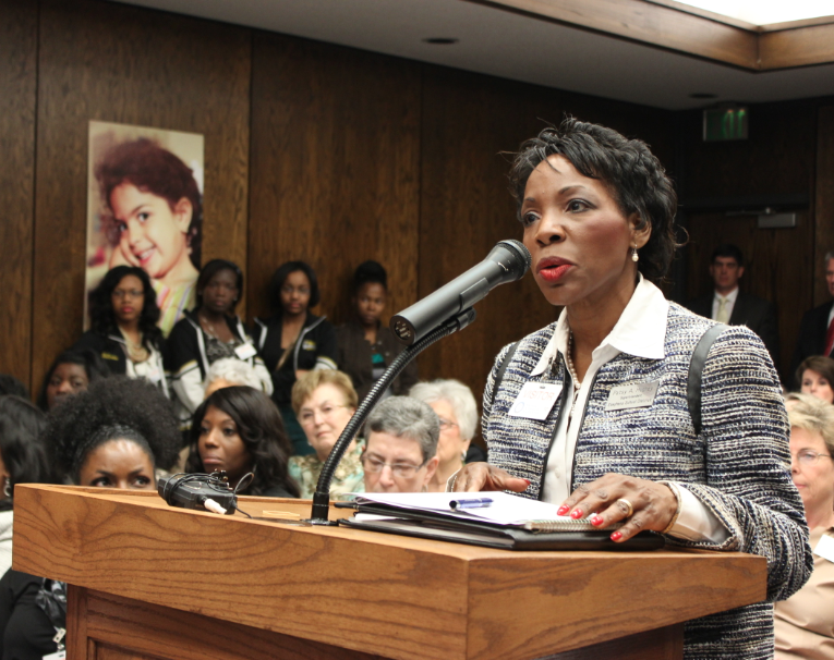 Stephens School District Superintendent Patsy Hughey addresses the state Board of Education while students from the district look on Thursday. The board voted to consolidate the district into three surrounding school districts.