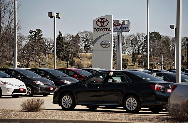 Vehicles sit in the lot outside Hiland Toyota dealership in Moline, Illinois, U.S., on Wednesday, April 9, 2014. Toyota Motor Corp., the world's largest carmaker, called back more than 6 million vehicles to fix a range of safety defects in one of the biggest recalls in automotive history. Photographer: Daniel Acker/Bloomberg