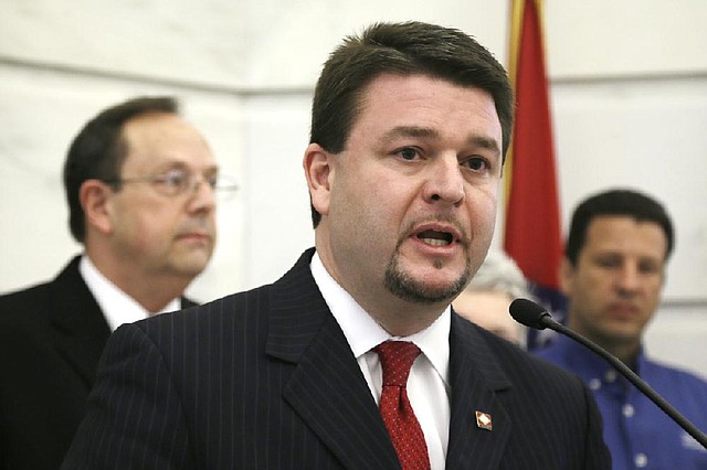 Sen. Jason Rapert, R-Bigelow, speaks at a news conference Friday at the state Capitol, where he praised Attorney General Dustin McDaniel’s decision to appeal a ruling that struck down the 12-week abortion ban in the state. 