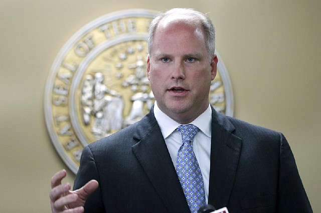Arkansas Attorney General Dustin McDaniel talks at a Little Rock, Ark., news conference Tuesday, May7, 2013, about his office's work related to an oil pieline spill earlier this year in Mayflower, Ark. (AP Photo/Danny Johnston)