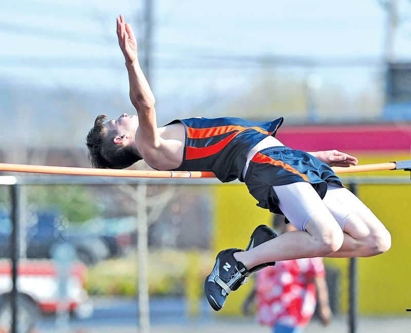  Staff Photo Michael Woods &#8226; @NWAMICHAELW Nate Raines of Rogers Heritage attempts to clear the bar Friday during the boys high jump at the Fayetteville Bulldog Relays track meet at Ramay Junior High in Fayetteville.
