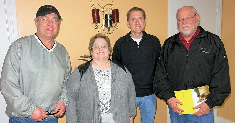 Submitted photo MONEY DONATED: Knights of Columbus Council 6419 recently donated $7,100 to Change Point Pregnancy Care and Parenting Resource Center. From left are David Myer, JoAnn Carter, Zack Nehus and Newton White.