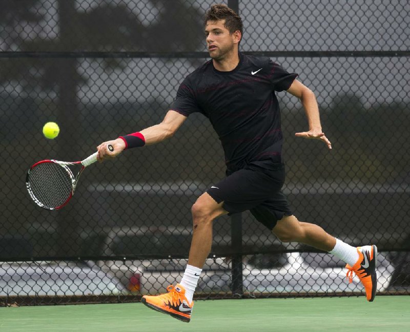 Arkansas Democrat-Gazette/MELISSA SUE GERRITS - 04/13/2014 -  Filip Krajinovic  hits a forehand during the Tour de Paul Tournament at Pleasant Valley Country Club April 13, 2014. Krajinovic won over Daniel Smethurst. 