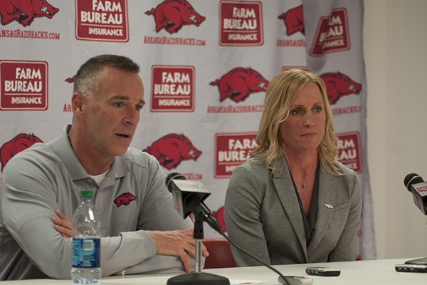 Arkansas women's basketball coach Jimmy Dykes and assistant coach Christy Smith speak during a news conference Monday, April 14, 2014 at Bud Walton Arena in Fayetteville.