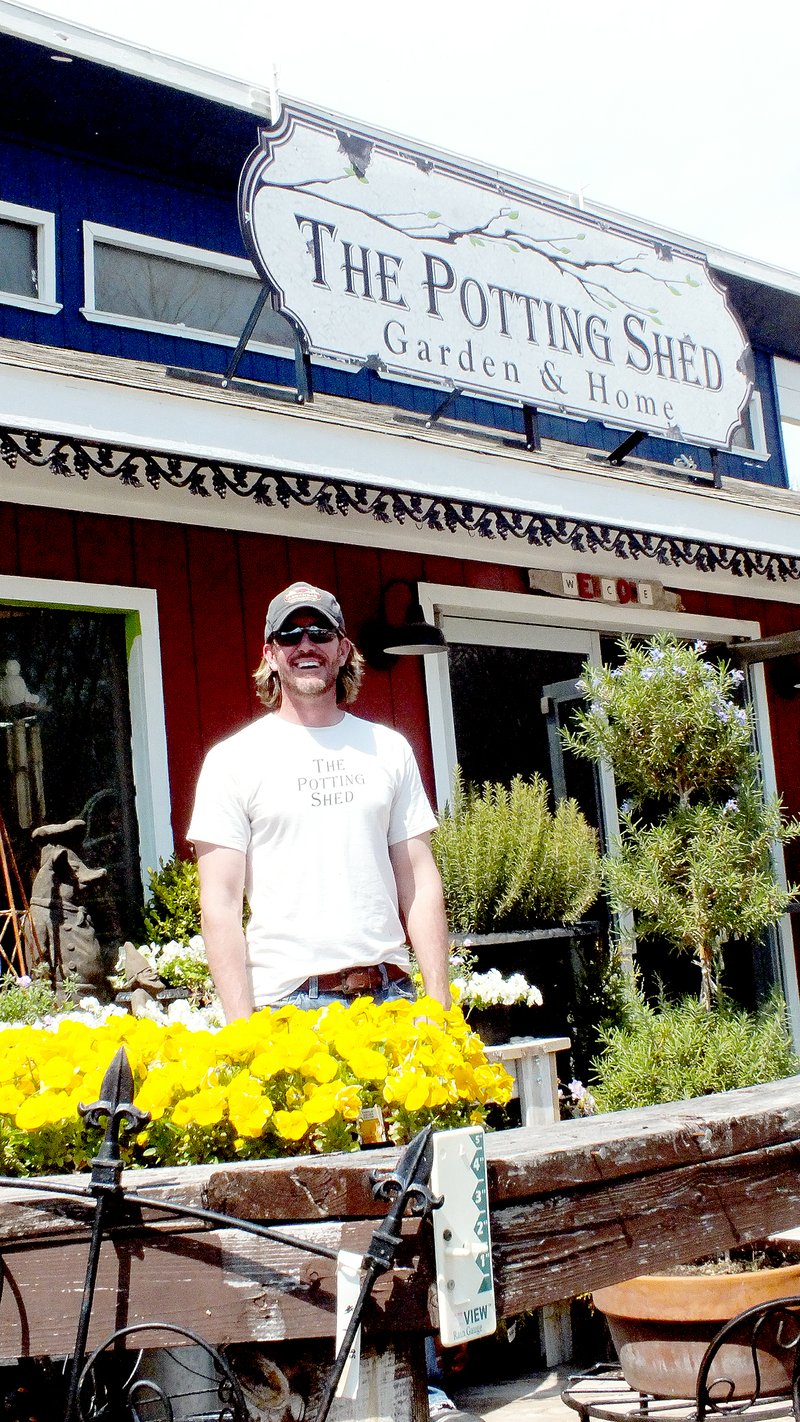 Cassi Lapp/The Weekly Vista The Potting Shed owner Scott Metz is busy getting the garden center ready for this year&#8217;s spring open house in its new location on McNelly Road in Bentonville. The open house will be held two weekends this month, April 19 and 20 and April 26 and 27.