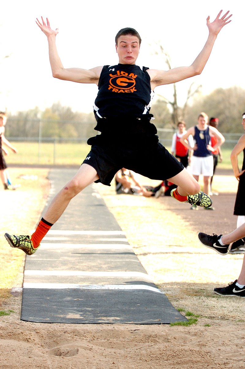 Photo by Randy Moll Logan Foster, Gravette senior, took first in the long jump, clearing 21 feet, 5 inches at Gentry&#8217;s track meet on Thursday. Foster also took second place in the triple jump, clearing 40 feet, 5.5 inches, just .5 inches short of the first-place winner from Farmington. For more sports, see Page 1B. For track results and photos, see Page 8B.