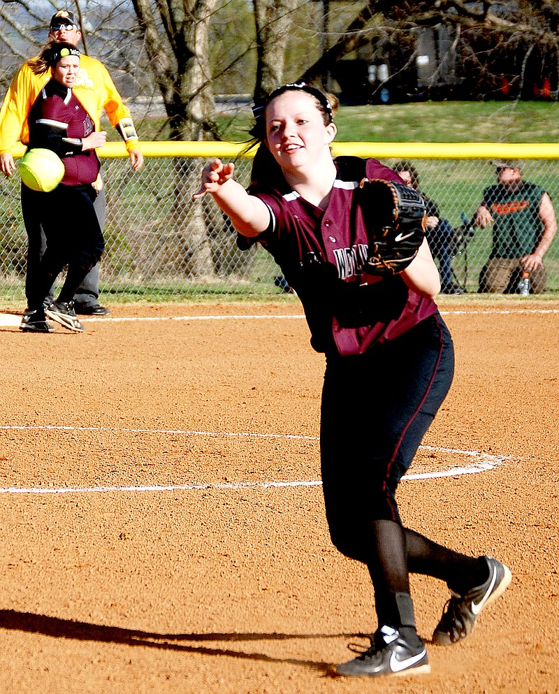 BEN MADRID ENTERPRISE-LEADER Lincoln pitcher Ashtyn Rothrock throws to first base.