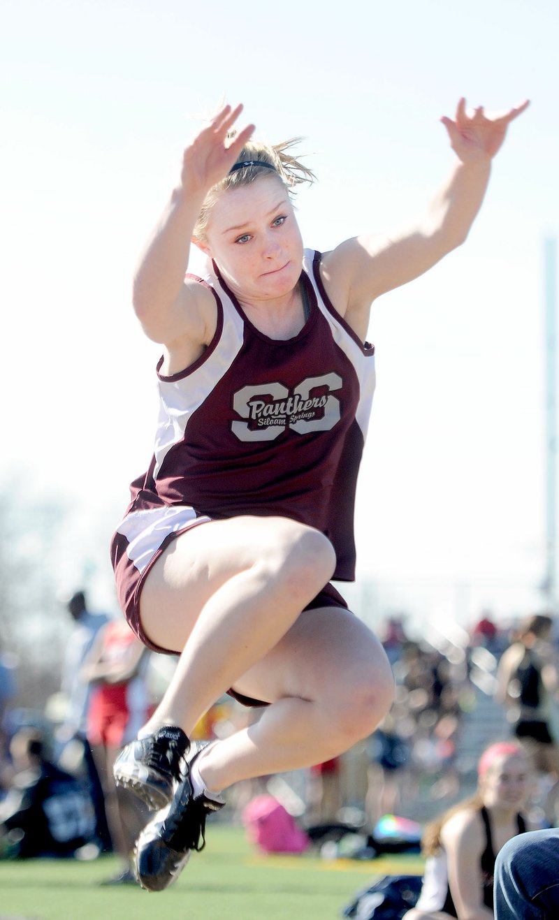 Samantha Baker/NWA Media Siloam Springs senior Ashlin Stock, shown here in the long jump at the Tiger Relays in Bentonville on March 20, will compete in several events Thursday at the annual Panther Relays held at Glenn W. Black Stadium.