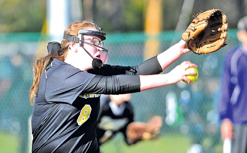 STAFF PHOTO SAMANTHA BAKER 
• @NWASAMANTHA 
Morgan Vaughan of Bentonville delivers a pitch Tuesday during the game against Fayetteville at the Lady Dawg Yard in Fayetteville.