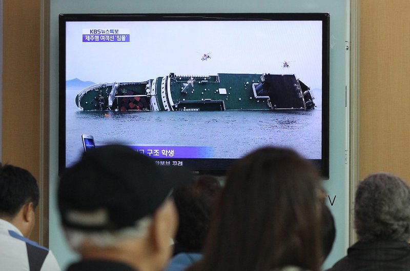 SEOUL, South Korea — A ferry carrying 459 people, mostly high school students on an overnight trip to a tourist island, sank off South Korea's southern coast on Wednesday, leaving nearly 300 people missing despite a frantic, hours-long rescue by dozens of ships and helicopters. At least four people were confirmed dead and 55 injured.
