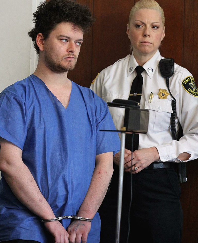 Kevin Edson is arraigned Wednesday in Boston Municipal Court after he was arrested Tuesday near the Boston Marathon finish line carrying a backpack containing a rice cooker on the anniversary of the bombings. 