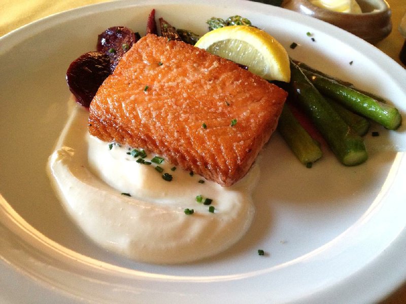 Pan-seared Salmon comes with creme fraiche, beets and asparagus at Terry’s Finer Foods the Restaurant on Kavanaugh Boulevard in the Heights. 