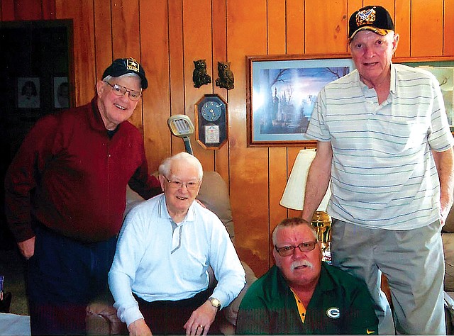  COURTESY PHOTOS 
Ervin Monnington (second from left) of Bentonville celebrated his 100th birthday April 5 with friends and family. Among those in attendance were his longtime golf buddies Bob Harris (from left), Jim Wozniak and Bill Hennings.