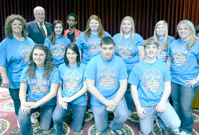 COURTESY PHOTO Students from the FCCLA class at McDonald County High School recently visited with State Rep. Bill Lant at the Missouri Capitol in Jefferson City while attending a conference in Columbia. Front row, left to right: Sydney Tinsley, Rachel Brown, Alec Laughlin and Rylan Lett. Back row: Debbie Shaffer (advisor), Rep.Bill Lant, Audy Stephens, Abdiladif Hassan, Myia Baker, Brooke Barnard, Amanda Deckard and Marie Strader (advisor).