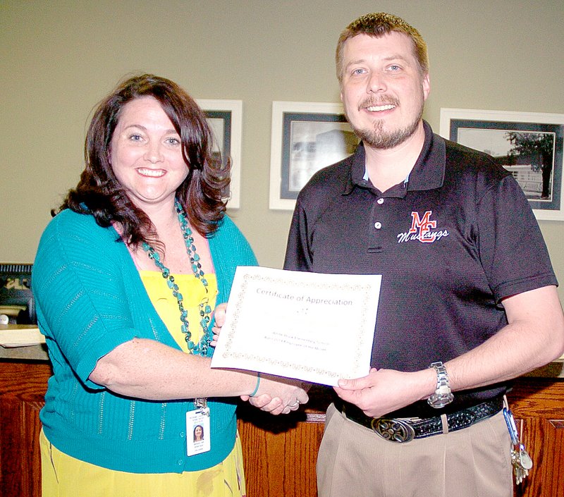 RICK PECK MCDONALD COUNTY PRESS Second-grade teacher Bethany Hall was honored by the McDonald County Board of Education at their meeting for being named Employee of the Month at White Rock School. The award was presented by Adam Lett, principal at White Rock.