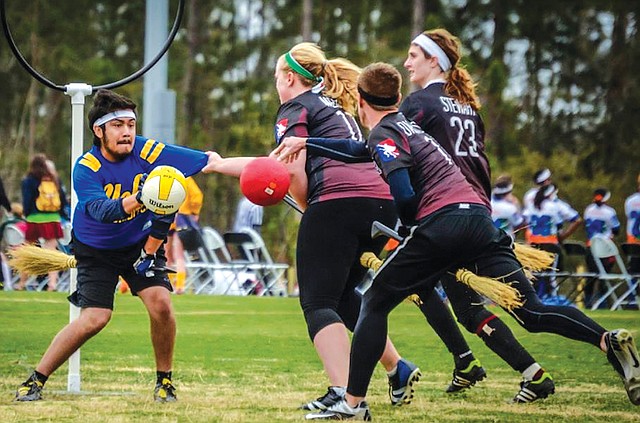 COURTESY PHOTO BEN HOLLAND PHOTOGRAPHY 
University of Arkansas Razorback quidditch plays against University of California at Los Angeles on April 6 during the International Quidditch Association World Cup VII in North Myrtle Beach, S.C.