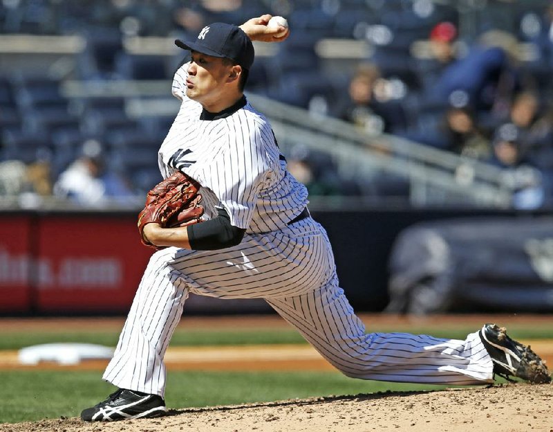 The Chicago Cubs saw why the New York Yankees signed Masahiro Tanaka to a seven-year, $155 million contract after he struck out 10 batters and allowed 2 bunt singles in a 3-0 victory Wednesday. 