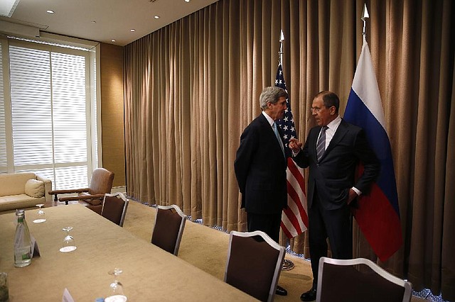 Secretary of State John Kerry (left) and Russian counterpart Sergey Lavrov, meeting Thursday in Geneva, agreed on measures to ease tensions in Ukraine, but Crimea was not discussed. 