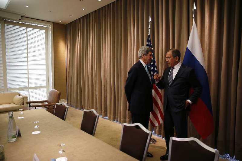 Secretary of State John Kerry (left) and Russian counterpart Sergey Lavrov, meeting Thursday in Geneva, agreed on measures to ease tensions in Ukraine, but Crimea was not discussed. 