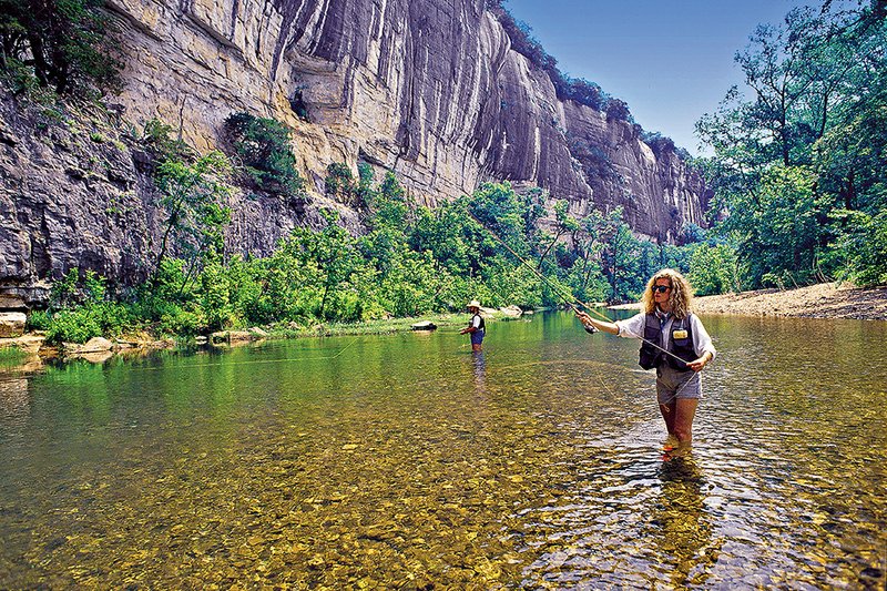 Many people enjoy fly-fishing because of the beautiful settings in which it can be practiced, like the Buffalo National River in the Arkansas Ozarks.