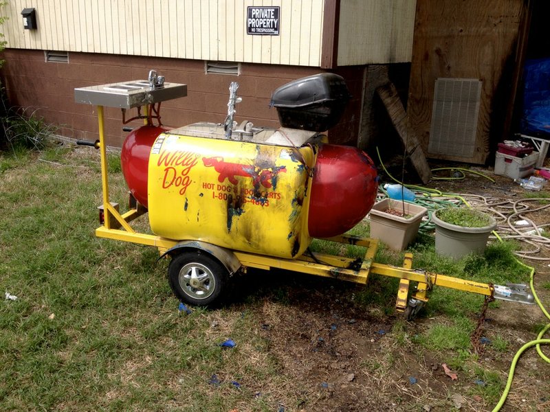 Hot dog seller Ean Bordeaux's cart is seen on Bragg Street in Little Rock on Friday, April 18, 2014.