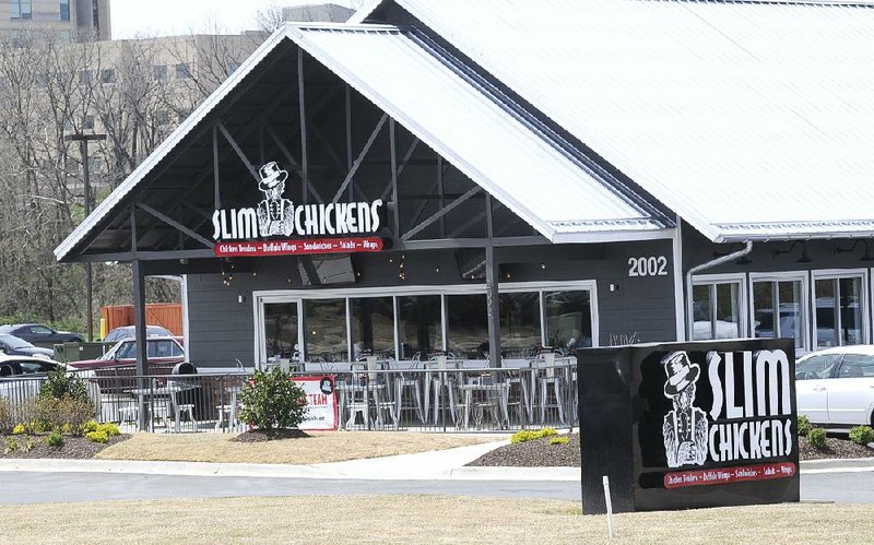 Fayetteville-based Slim Chickens has 13 locations in Arkansas and Oklahoma, including this one on Promenade Boulevard in Rogers. The chain’s owners hope to grow the restaurant nationally through franchises. 