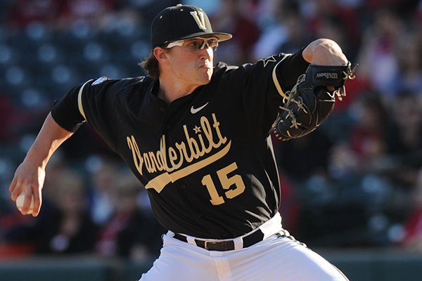 Vanderbilt starter Carson Fulmer delivers a pitch during the first inning against Arkansas Saturday, April 19, 2014, at Baum Stadium in Fayetteville.