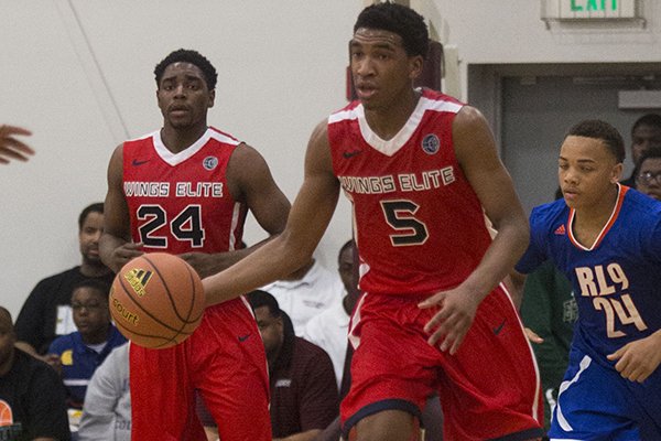 Wings Elite's Malik Monk looks for an opening pass during their game against RL9 at the Real Deal tournament in Little Rock, April 18, 2014. 