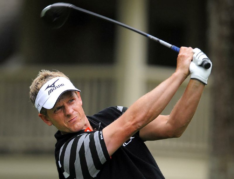 English golfer Luke Donald had an eagle and six birdies to shoot 66 on Saturday to take a two-stroke lead over John Huh after three rounds at the RBC Heritage in Hilton Head Island, S.C. 