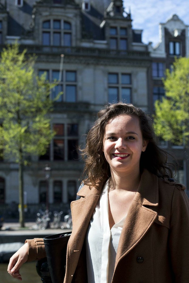 Charlotte van den Berg stands outside the Netherlands’ Institute for War, Holocaust and Genocide Studies in Amsterdam. 