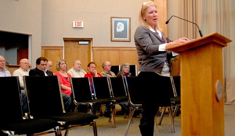 Jeff Della Rosa/Siloam Sunday Resident Grace Davis speaks to the city board Tuesday night. Davis spoke against the proposed ordinance that would make failing to return an overdue library book a city violation, like a traffic violation.