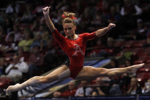 Arkansas' Katherine Grable competes on the floor exercise during the NCAA women's gymnastics championships on Friday, April 18, 2014, in Birmingham, Ala. (AP Photo/Butch Dill)