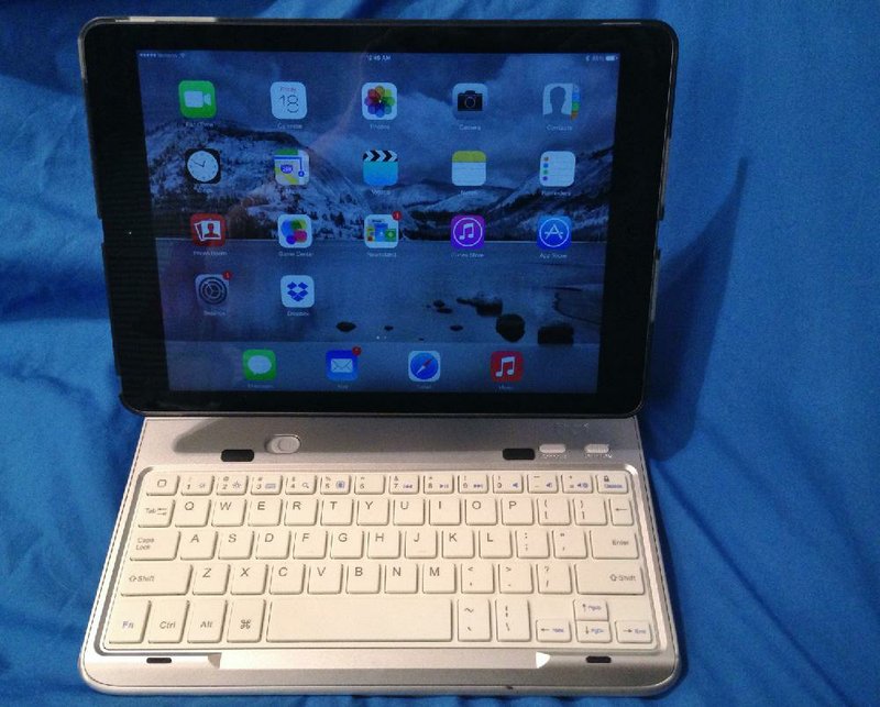 Special the the Arkansas Democrat Gazette - 04/18/2014 - The FAVI Entertainment Swivel Screen Portfolio for iPad Air combines a case, a stand and a Bluetooth keyboard into one product. 