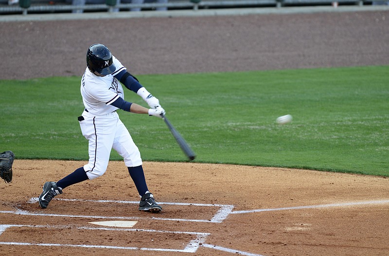 STAFF PHOTO ANTHONY REYES 
Whit Merrifield, NWA Naturals, connects for a hit against Frisco on April 10 at Arvest Ballpark in Springdale.