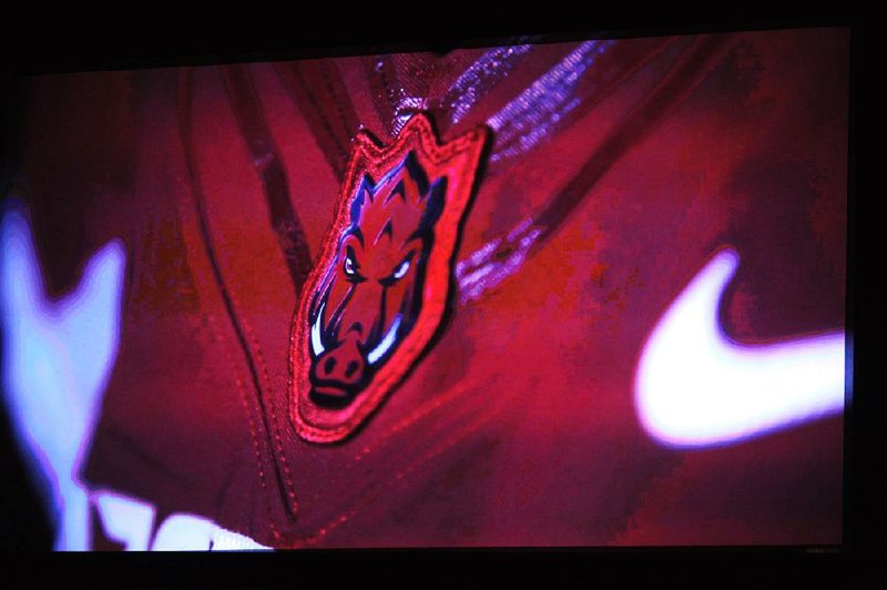 NWA Media/ANDY SHUPE -  A newly designed secondary logo for Arkansas athletics is displayed on a television screen during the third annual HOGSPY Awards ceremony Monday, April 21, 2014, at the Walton Arts Center in Fayetteville.