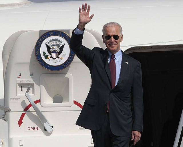 U.S. Vice President Joe Biden arrives at Borispol airport outside Kiev, Ukraine on Monday April 21, 2014. Vice President Joe Biden on Monday launched a high-profile visit to demonstrate the U.S. commitment to Ukraine and push for urgent implementation of an international agreement aimed at de-escalating tensions even as violence continues. Biden planned to meet Tuesday with government leaders who took over after pro-Russia Ukrainian President Viktor Yanukovych was ousted in February following months of protests. The White House said President Barack Obama and Biden agreed he should make the two-day visit to the capital city to send a high-level signal of support for reform efforts being pushed the new government. (AP Photo/Sergei Chuzavkov)