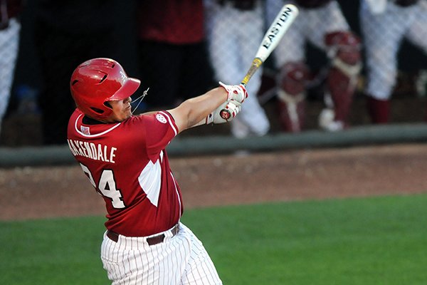 Arkansas' Blake Baxendale gets a piece of the ball Tuesday, April 22, 2014, during the game against Northwest State at Baum Stadium in Fayetteville.