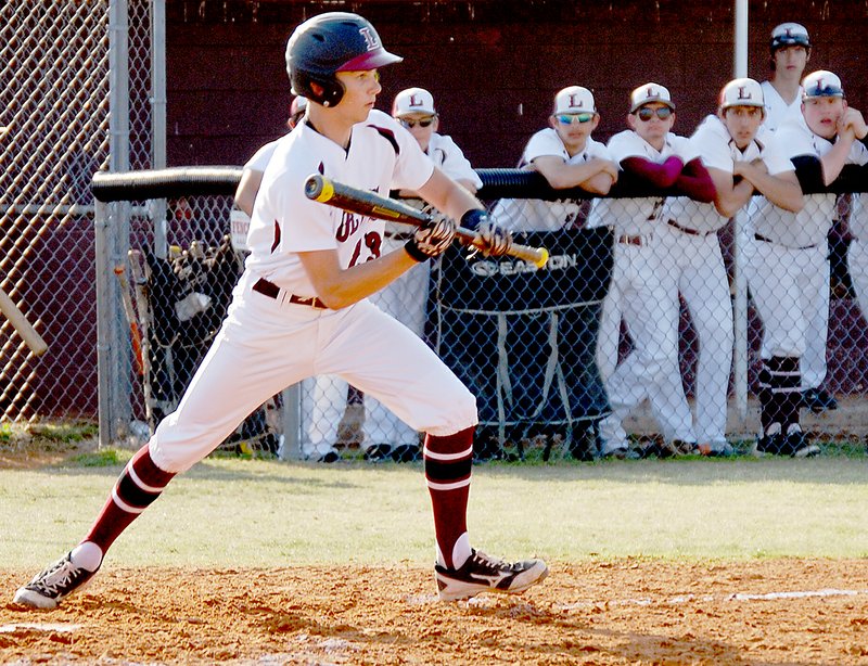 BEN MADRID ENTERPRISE-LEADER 
Cord McCaslin squares to bunt in the Lincoln versus Prairie Grove game on Friday.