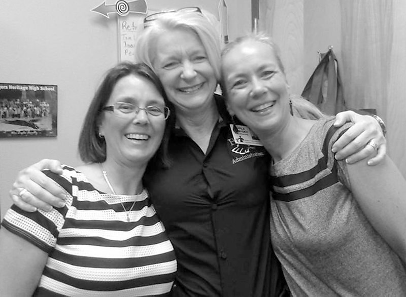 Submitted Photo Marijke von den Bosch (left) and Caroline Visser (right) helped Darla Tomasko celebrate a birthday.