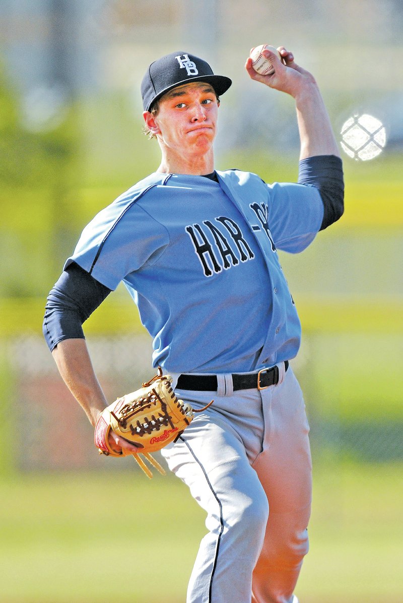  STAFF PHOTO SAMANTHA BAKER • @NWASAMANTHA Brady Patrick of Springdale Har-Ber delivers a pitch Wednesday during the game against Rogers High at Randal Tyson Recreation Complex in Springdale.